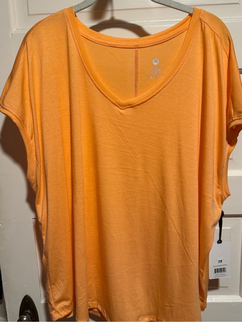 RBX Women's V-Neck Short Sleeve Tee in Peach
